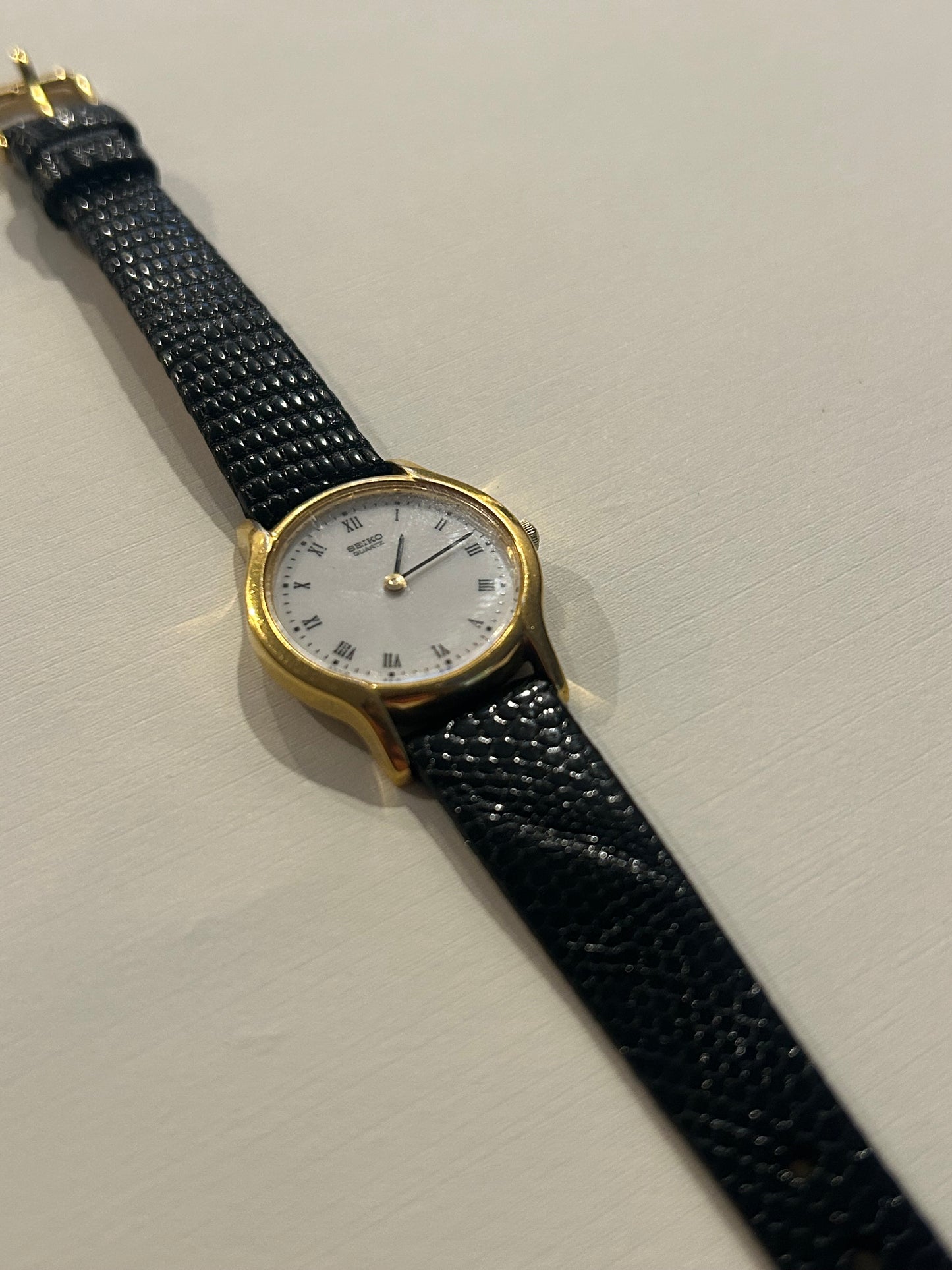 Vintage Seiko Gold & Black Roman Quartz Watch (1980s)