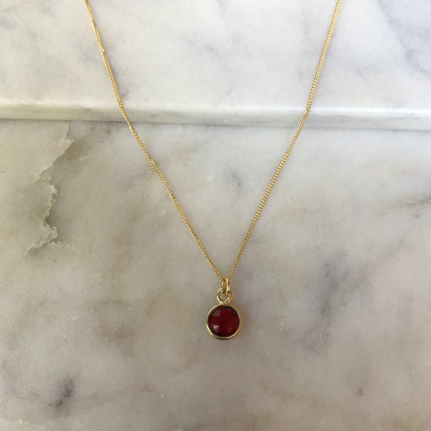 January’s Garnet In Gold