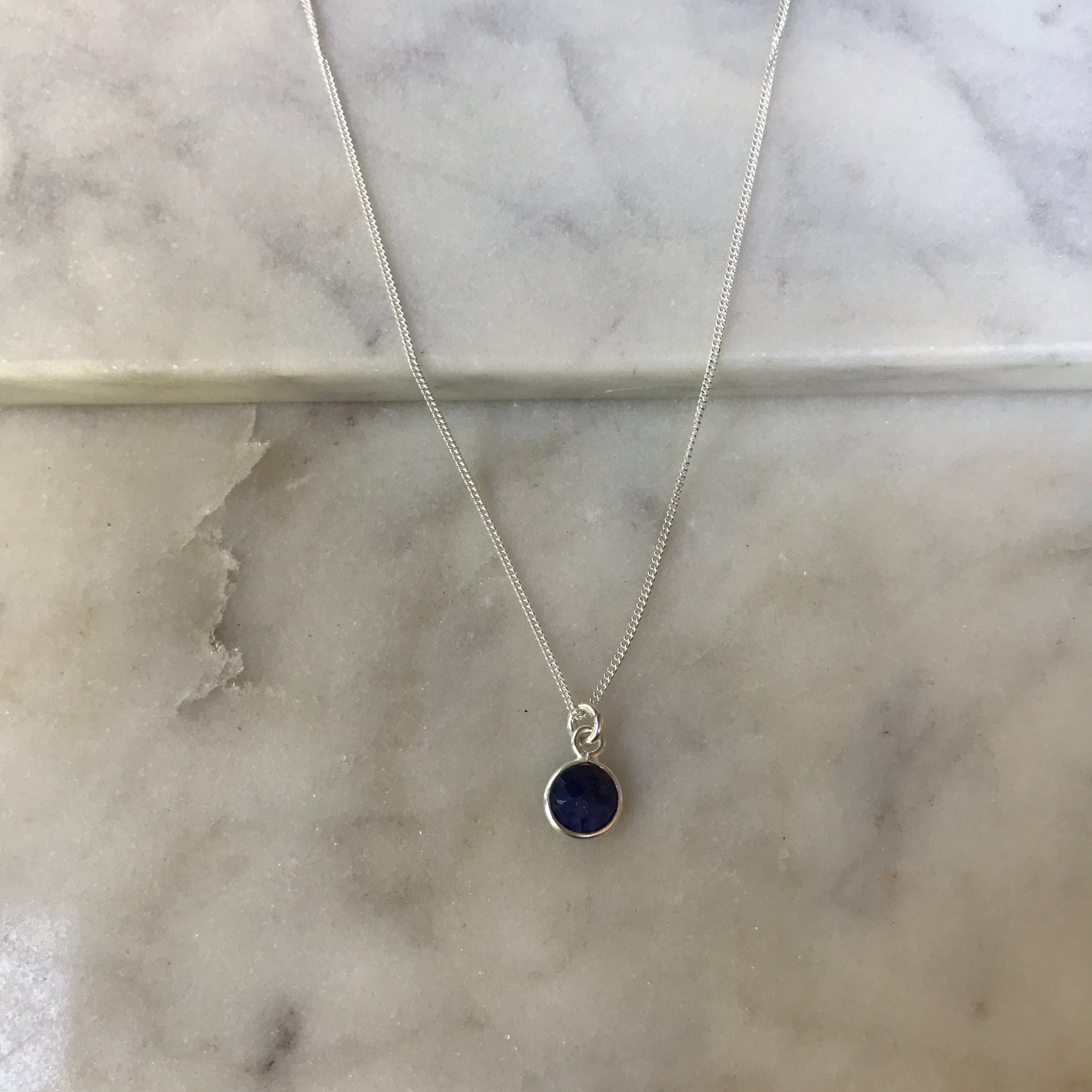 September’s Sapphire In Silver