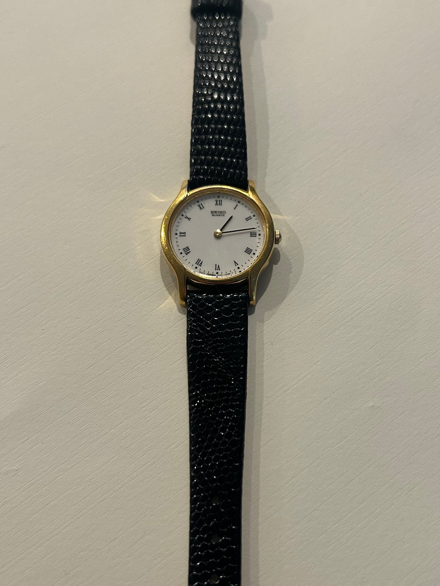 Vintage Seiko Gold & Black Roman Quartz Watch (1980s)