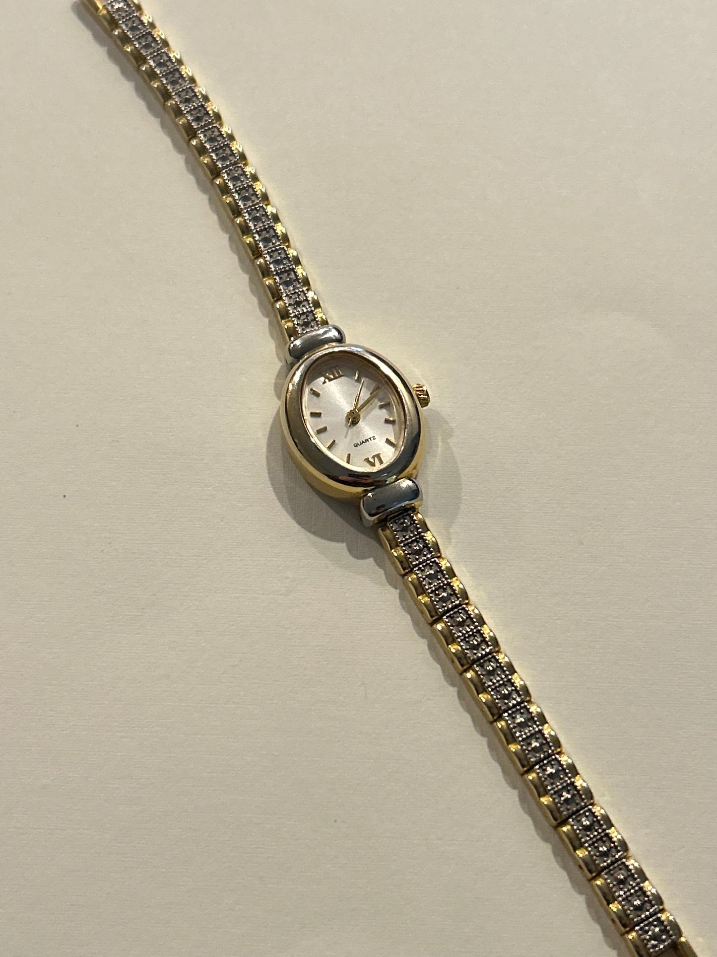Two Toned Oval Bracelet Watch with Diamond-Cut Band
