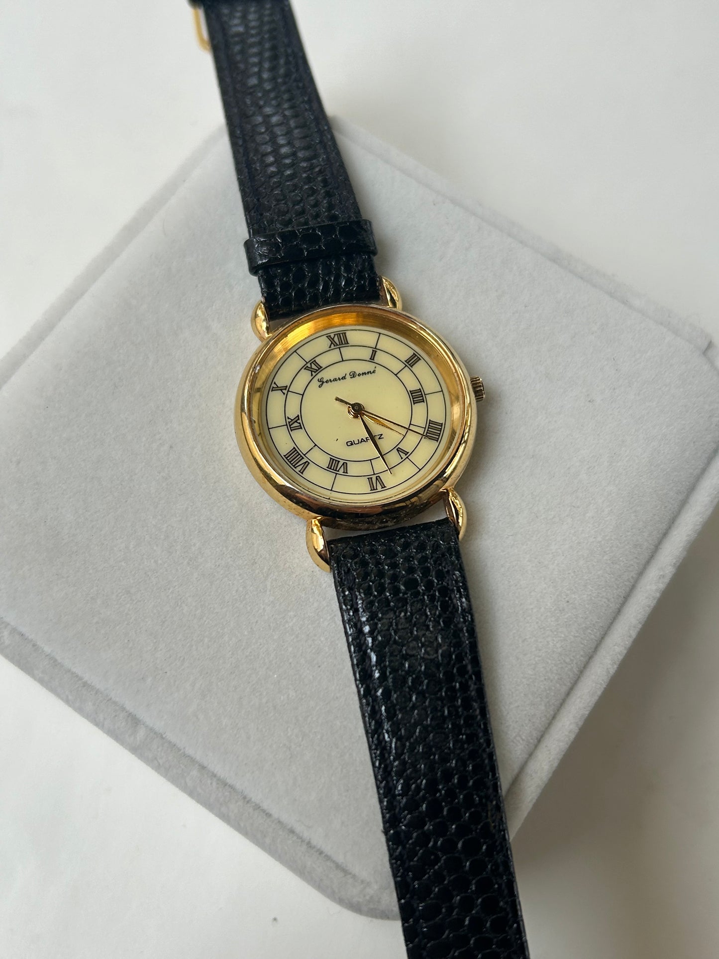 Girard Donne ; Black and Gold Watch