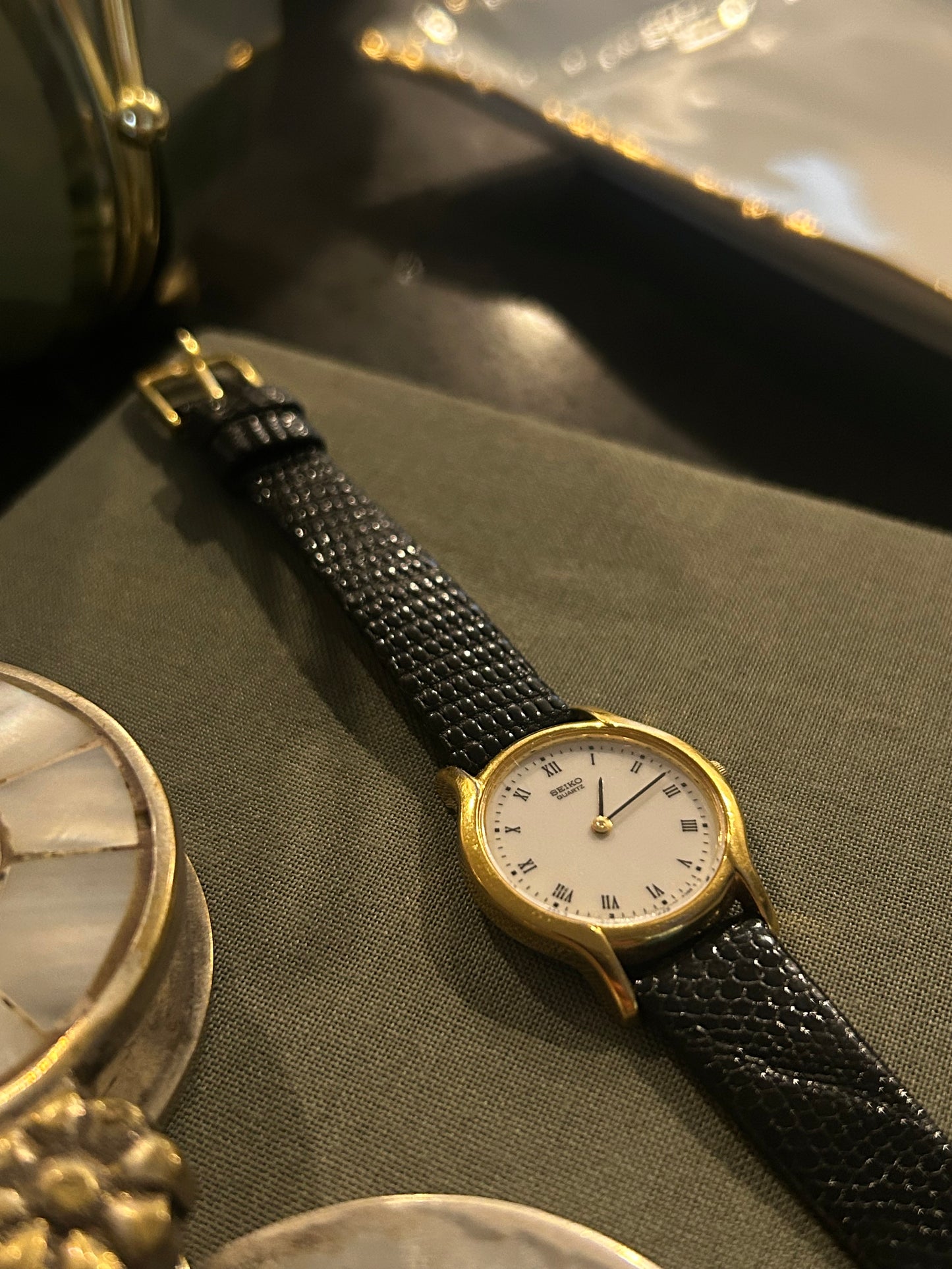 Vintage Seiko Gold & Black Roman Quartz Watch (1980s)