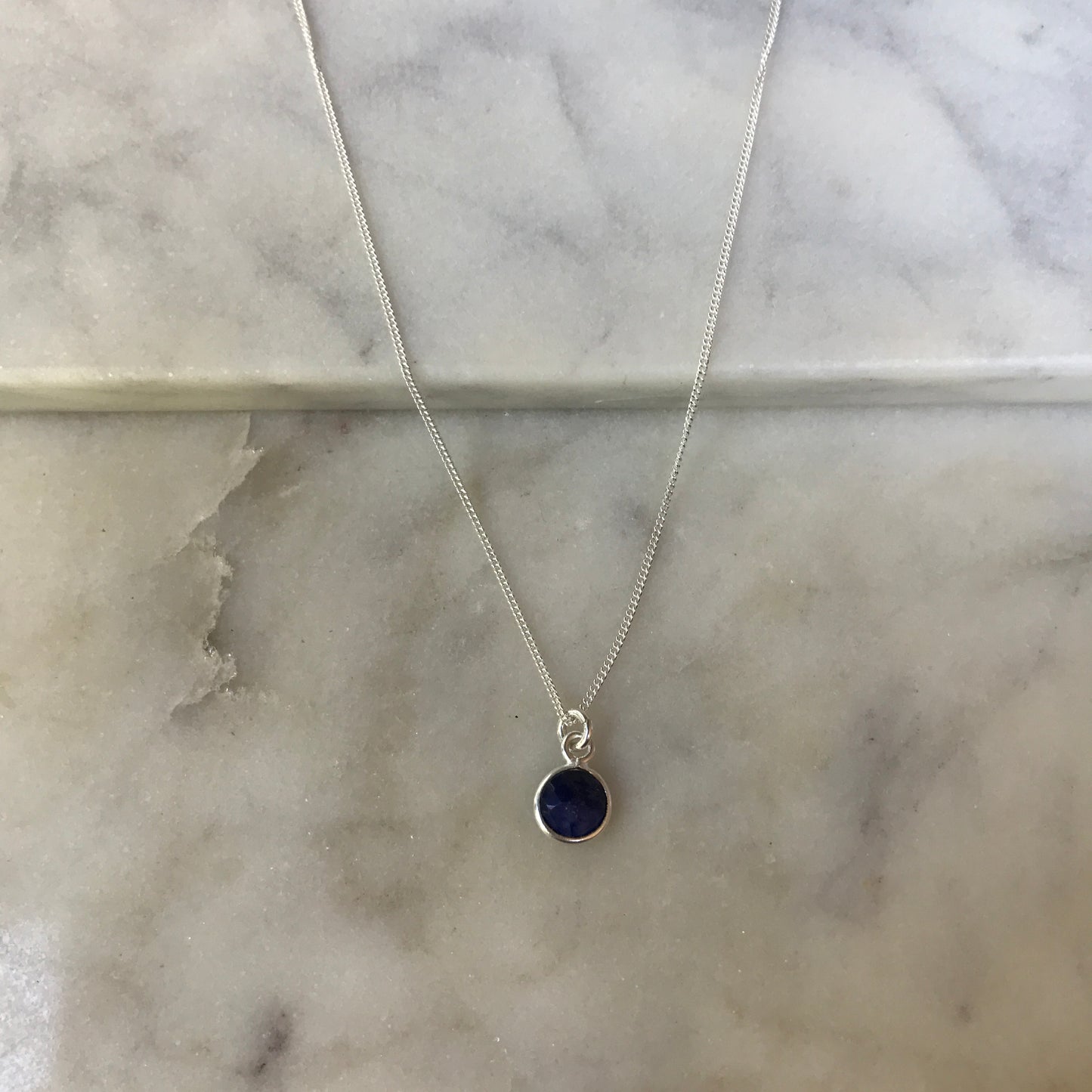 September’s Sapphire In Silver