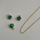 May’s Emerald In Gold