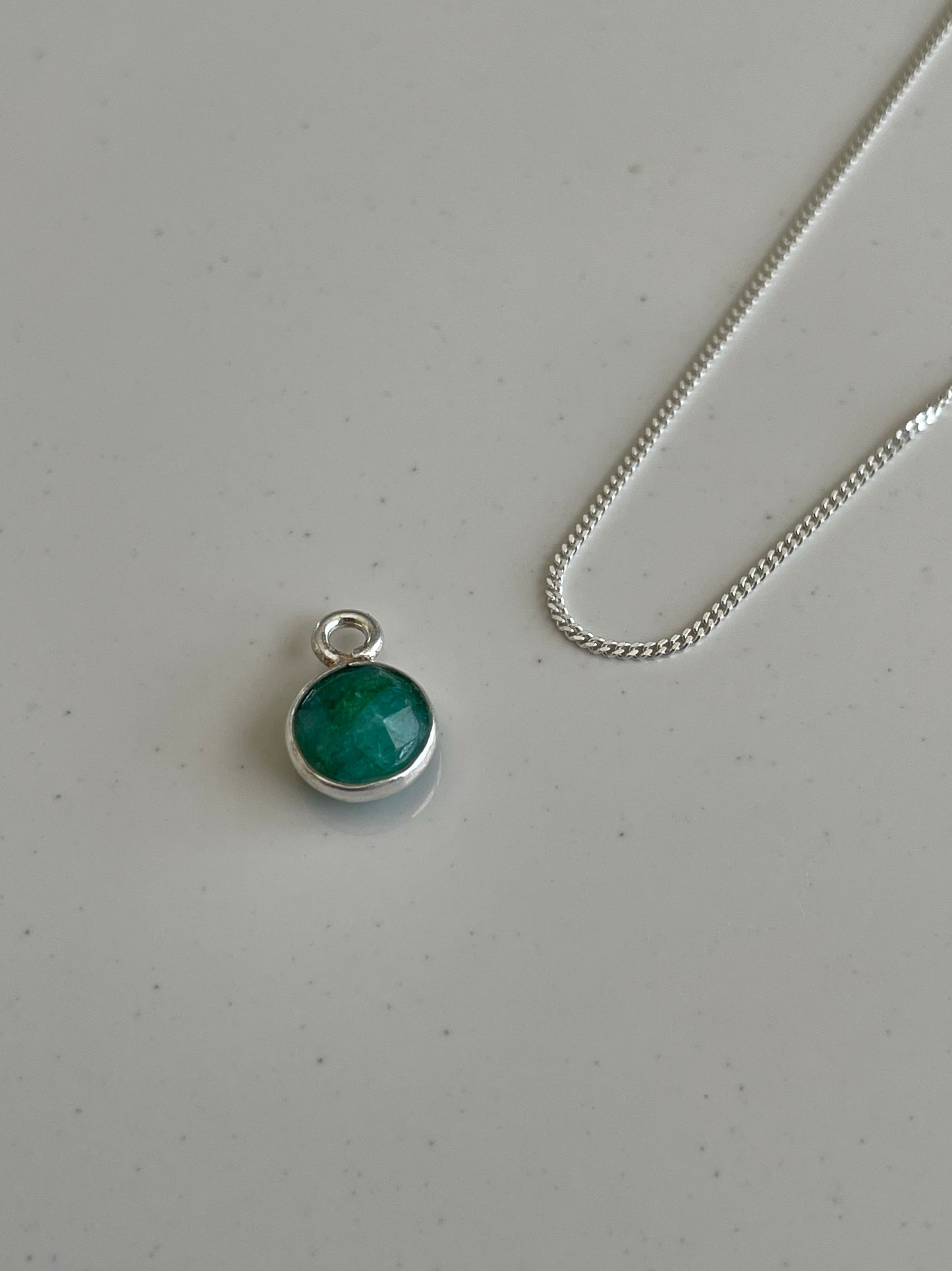 May’s Emerald In Silver
